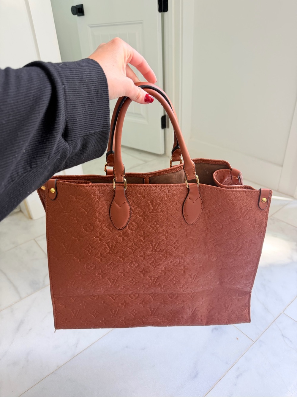 Louis Vuitton Monogram Embossed Brown Leather Tote